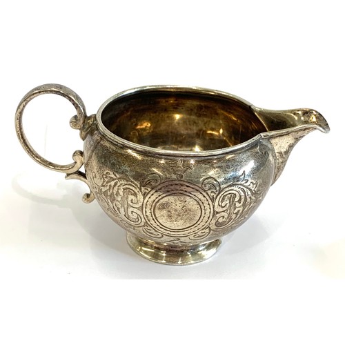 66 - Engraved victorian silver cream jug by George Adams London 1874