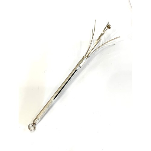 71 - Silver folding cocktail stirrer