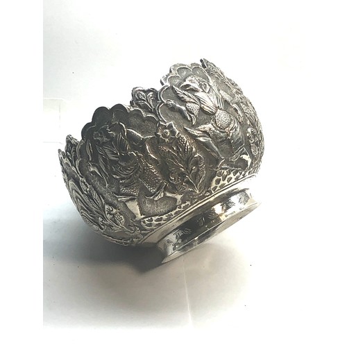 8 - Antique silver Asian embossed bowl measures approx height 6.2cm by 8.7cm dia please see images for d... 