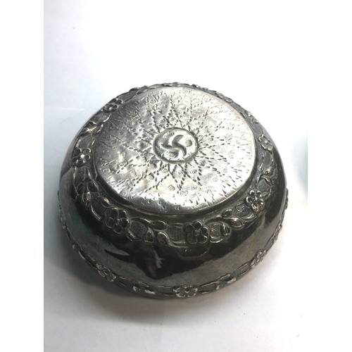 18 - Asian silver lidded bowl floral embossed design measures approx 9.2cm dia  not hallmarked but has be... 