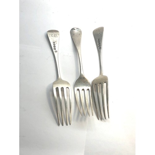 22 - 3 antique Georgian silver forks each measures approx 18cm London silver hallmarks weight 100g please... 