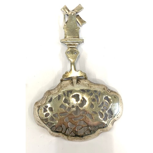 73 - Silver pierced spoon with windmill import marked