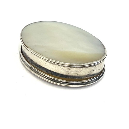 76 - Oval 18th century silver and mother of pearl box