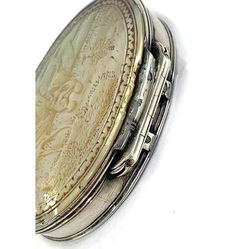 76 - Oval 18th century silver and mother of pearl box