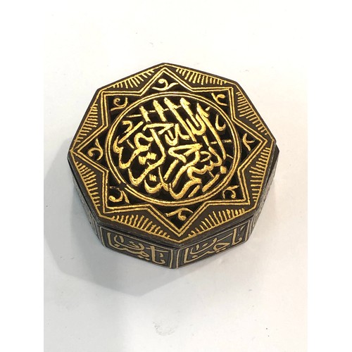 413 - Persian Islamic steel inlaid with gold pierced box, approximate measurements: 2 inches in diameter