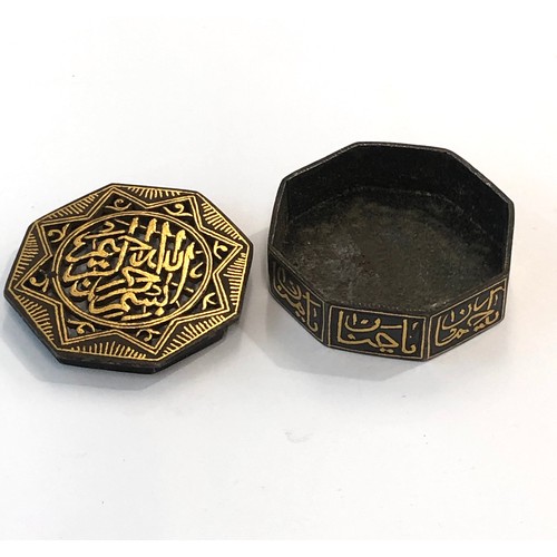 413 - Persian Islamic steel inlaid with gold pierced box, approximate measurements: 2 inches in diameter