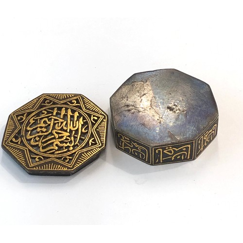 413 - Persian Islamic steel inlaid with gold pierced box, approximate measurements: 2 inches in diameter