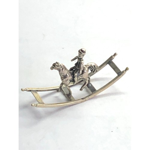 37 - Dutch silver miniature child on rocking horse  dutch silver sword hallmark please see images for det... 