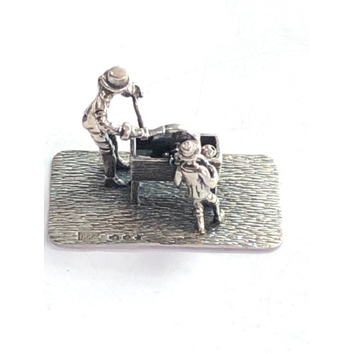 38 - Dutch silver miniature men on grinding wheel  dutch silver sword hallmark please see images for deta... 