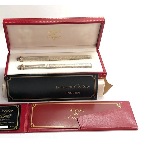 435 - Boxed les must de cartier santos fountain pen and ball point pen comes in box with all paper work pl... 