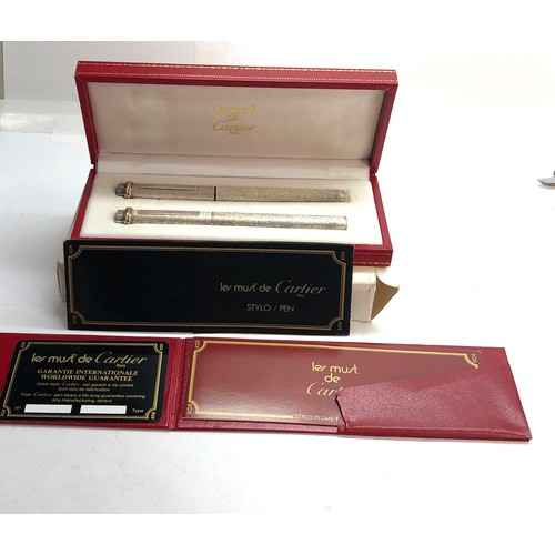 435 - Boxed les must de cartier santos fountain pen and ball point pen comes in box with all paper work pl... 