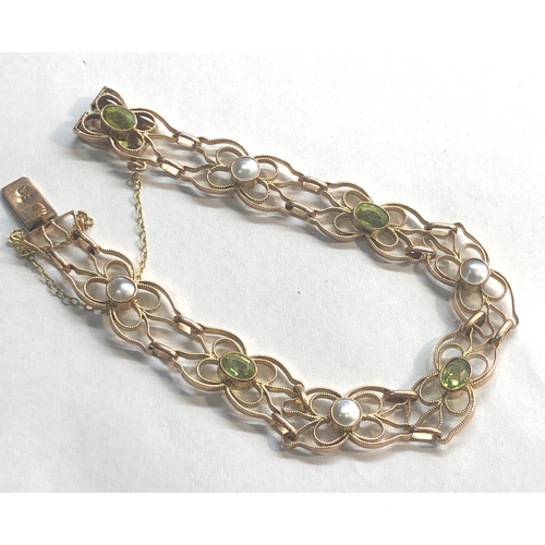 420 - Fine murrle bennett 9ct gold peridot and pearl bracelet measures approx 20cmlong by 10mm wide in goo... 