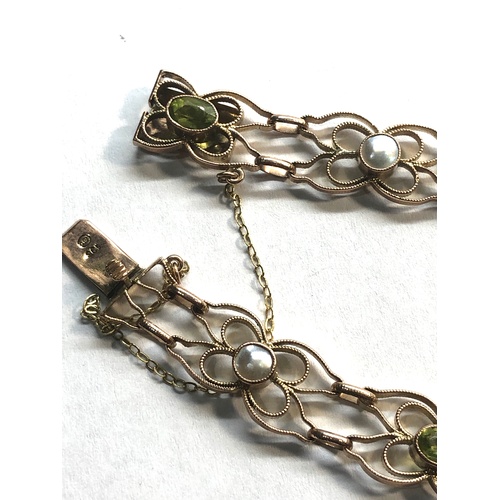 420 - Fine murrle bennett 9ct gold peridot and pearl bracelet measures approx 20cmlong by 10mm wide in goo... 