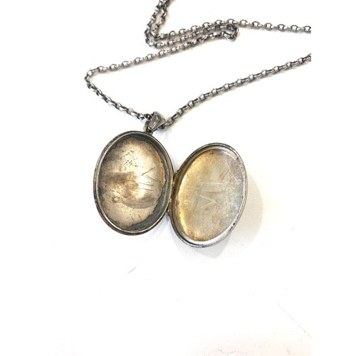 157 - A Victorian white metal pendant and chain circa 1895