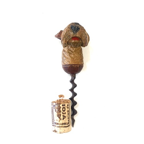 200 - 1920s novelty corkscrew modelled as a Irish Terrier dog's head with glass bead eyes