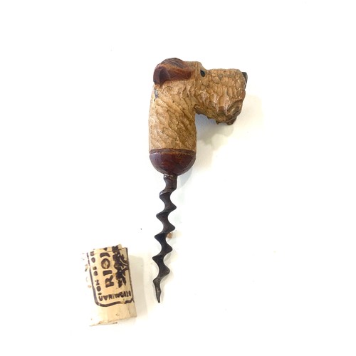 200 - 1920s novelty corkscrew modelled as a Irish Terrier dog's head with glass bead eyes