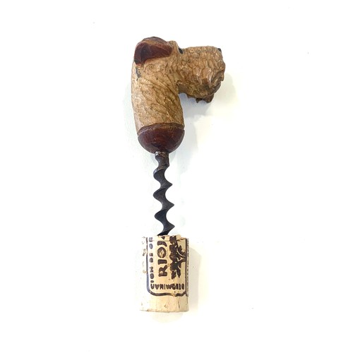 200 - 1920s novelty corkscrew modelled as a Irish Terrier dog's head with glass bead eyes