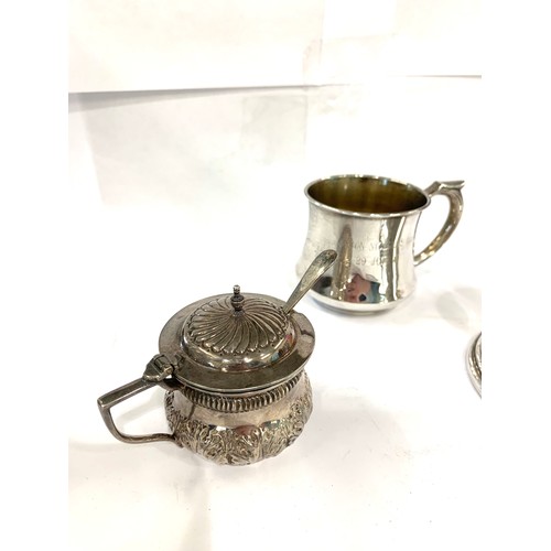 71 - 3 vinatge silver items includes mustard with spoon candle stick and silver mug please see images for... 