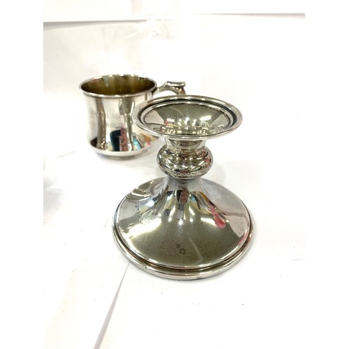 71 - 3 vinatge silver items includes mustard with spoon candle stick and silver mug please see images for... 