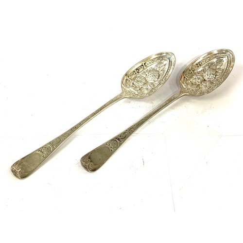 67 - Pair of antique silver berry spoons London silver hallmarks each measures approx 22.5cm long total w... 