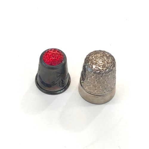 77 - 2 vintage silver thimbles