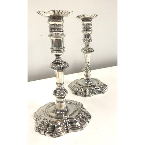 98 - Pair silver cast Georgian candlesticks, dated 1742, approximate weight 1001g, Height 20cm