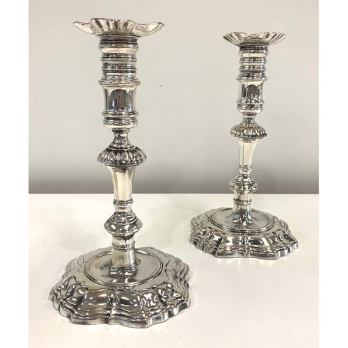 98 - Pair silver cast Georgian candlesticks, dated 1742, approximate weight 1001g, Height 20cm