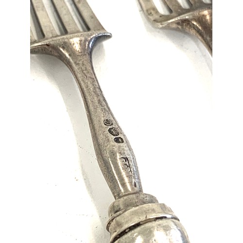 101 - Set 6 George III forks, dated 1818 with contemporary porcelain handles