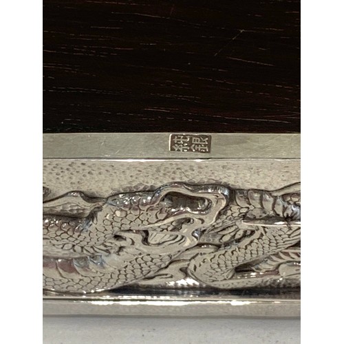 109 - Japanese silver box depicting dragons, approximate measurements: Width 7.5cm, Depth 5cm, Height 4.5c... 