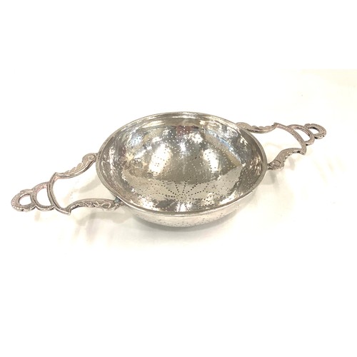 124 - Antique lemon strainer 18th century possibly Irish