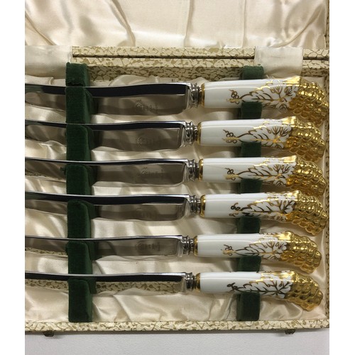 57 - Boxed set of 6 Royal Crown Derby knives in original box with a set of 6 boxed bird spoons