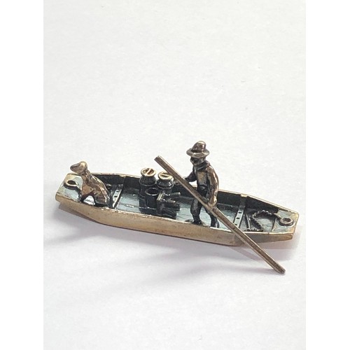 112 - Vintage Dutch silver miniature man rowing a boat with his dog  dutch silver hallmarks please see ima... 