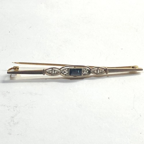 144 - Art deco 18ct gold diamond and sapphire brooch measures approx 63mm wide weight 3.5g please see imag... 