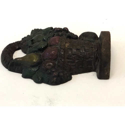 55 - Cast iron antique fruit basket door stop