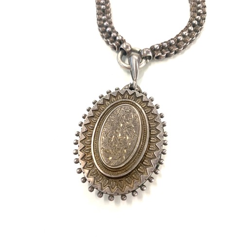 132 - Victorian silver locket and collar