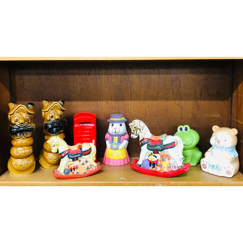 14 - Shelf of novelty money boxes