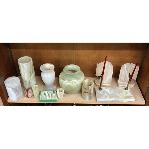 23 - Selection of onyx items includes book ends, pen stand etc