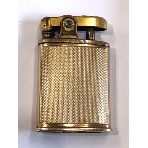 231 - Antique 9ct gold lighter hallmarked 9ct outer casing only ronson light company u.sa measures 5cm by ... 