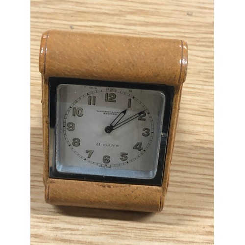 11 - WW2 era cockpit clock with small folding leather cased 8 day travel clock