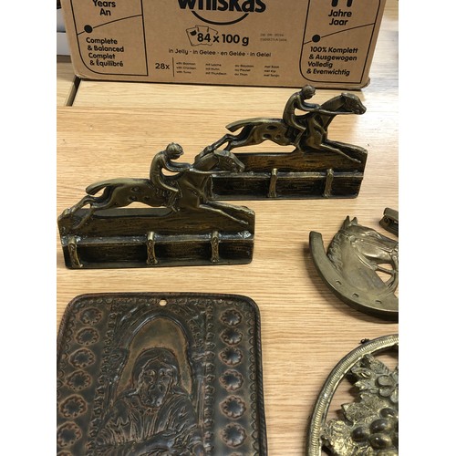 8 - Quantity of vintage and antique brass and bronze items including bookends door knocker and two plaqu... 