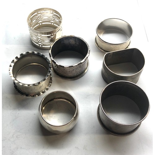 79 - 7 silver napkin rings weight 115g