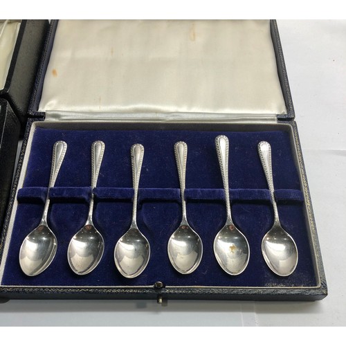 76 - Boxed set of silver tea spoons and a boxed egg cup and spoon Birmingham silver hallmarks worn