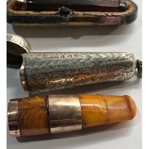 432 - 2 gold mounted amber cheroot holders cased n silver and leather cases age related wear and damage