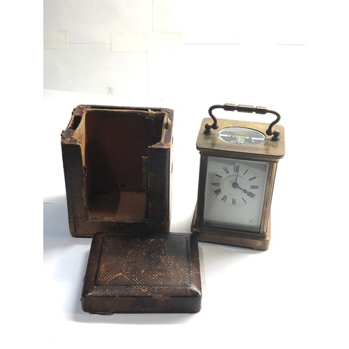 463 - Cased antique brass carriage clock not working