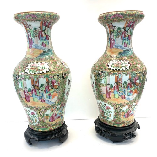 410 - large pair of Chinese vases on wooden carved stands each measures approx 43cm including stands in go... 