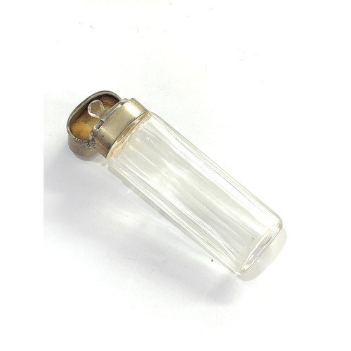 11 - Antique silver top perfume bottle complete with stopper dutch silver sword hallmarks measures approx... 