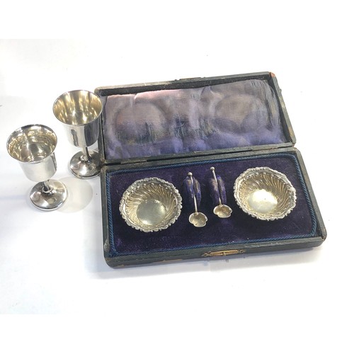 66 - Silver items includes 2 small silver goblets height 7cm and boxed silver salts boxed