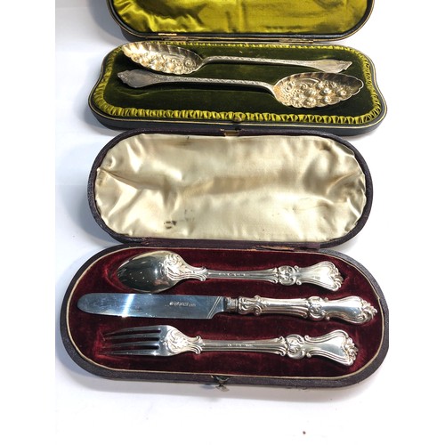 44 - Antique boxed silver berry spoons and boxed silver knife fork and spoon