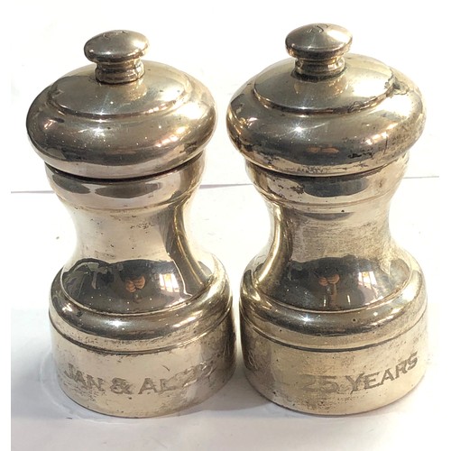 15 - 2 large silver pepper mills /grinders engraved to base rim london silver hallmarks