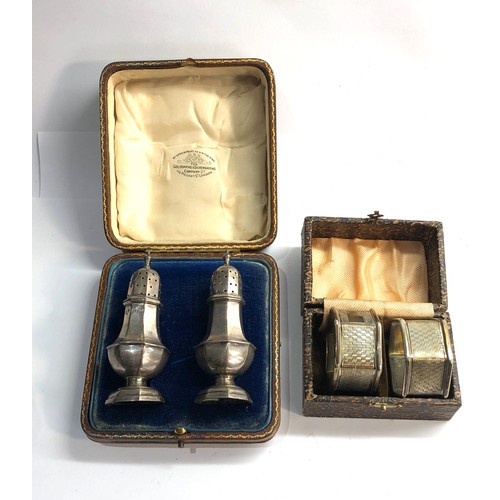 1 - Vintage boxed silver peppers and pair of boxed silver napkin rings